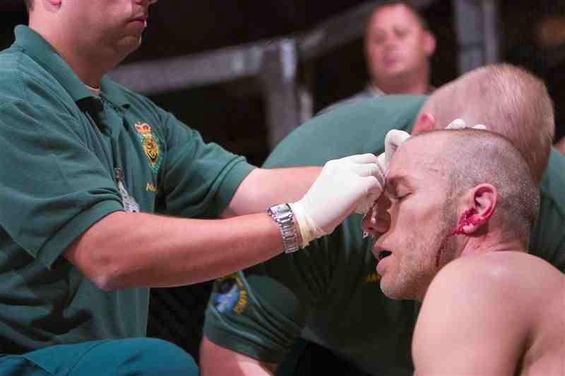 Our paramedic treating a fighter cageside